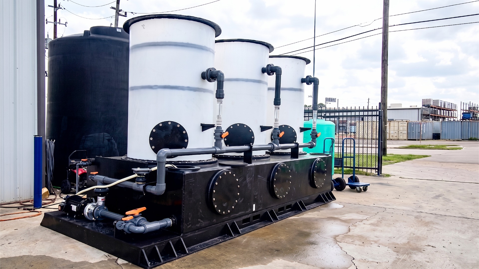 Large, three column acid neutralization & vent handling system with piping, valves, and pumps