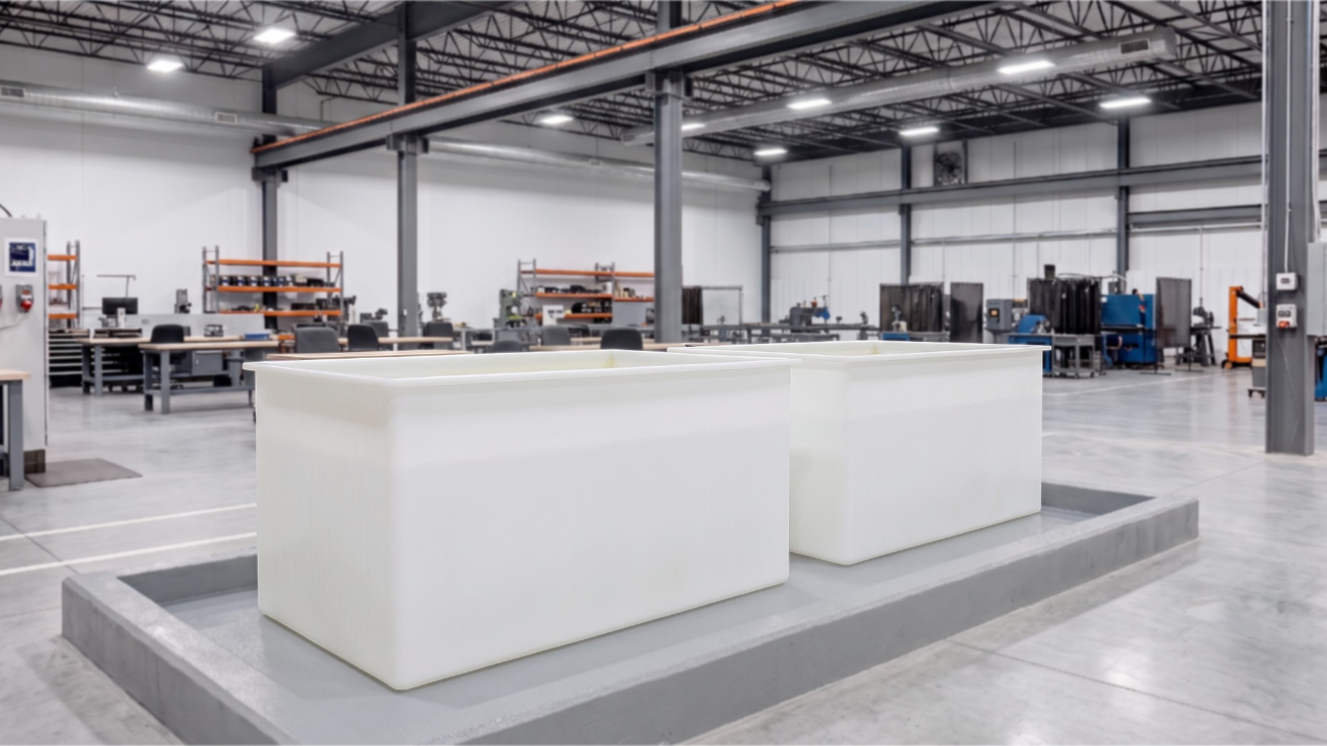 An image showing two custom made polypropylene tanks, one for chemical immersion stripping, one for follow up rinsing.