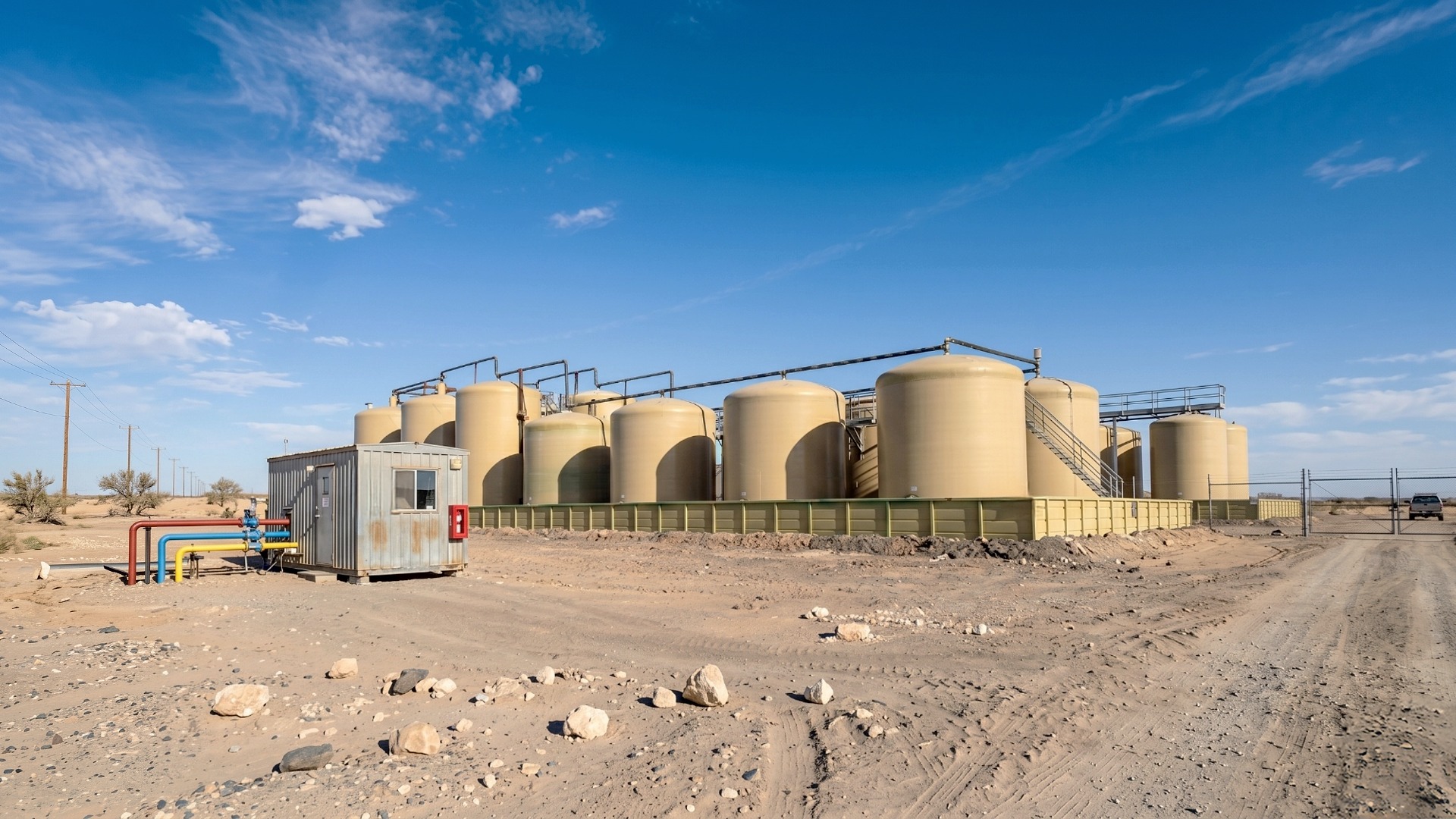 Fiberglass tank farm for oil and gas application involving storage and distribution.