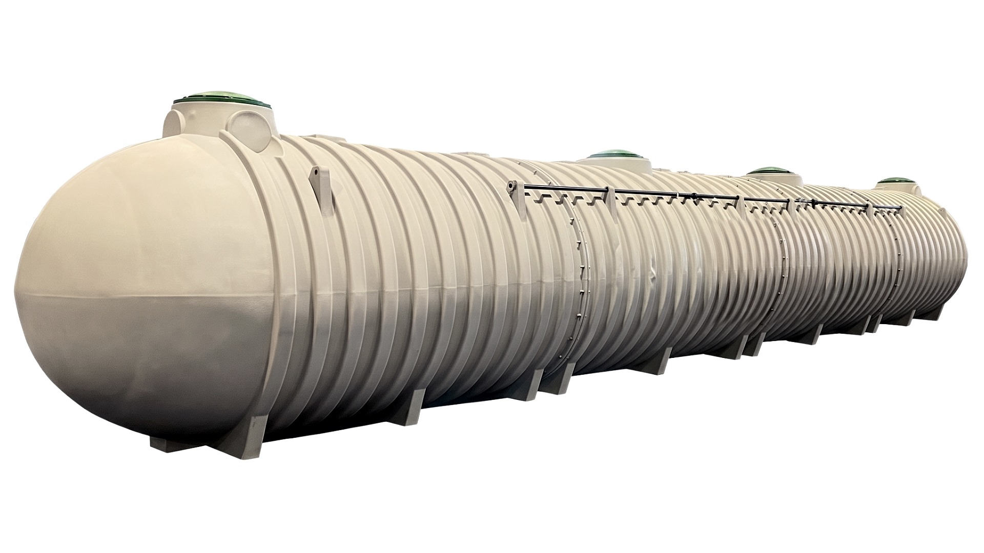 An image of a long 20000 gallon underground polyethylene storage tank with robust structural ribs along its side, four manway access ports, and lift bars on a plain white background